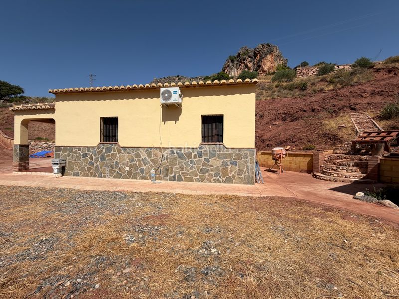 Foto 1a6d0f54-3b67-4972-addb-82f575ff7266. Masia amb xemeneia a Ardales