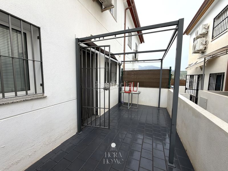 Foto 7a6c56d0-0d5b-411b-9517-9fcc2e989a0a. Casa adossada amb xemeneia piscina a Álora