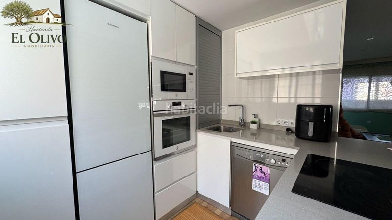 Foto 1288734b-1b57-463f-8642-ff0822f9cdf0. Maison jumelée avec parking dans Retamar Almería