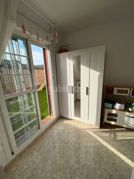 Foto f203cf0d-8471-4fba-ac96-b515f1197384. Casa adossada amb aparcament a Benajarafe
