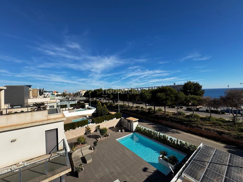 Foto 456c44e2-8cb6-47c8-90e7-b160d05e5f35. Casa amb aparcament a Playa Flamenca Orihuela