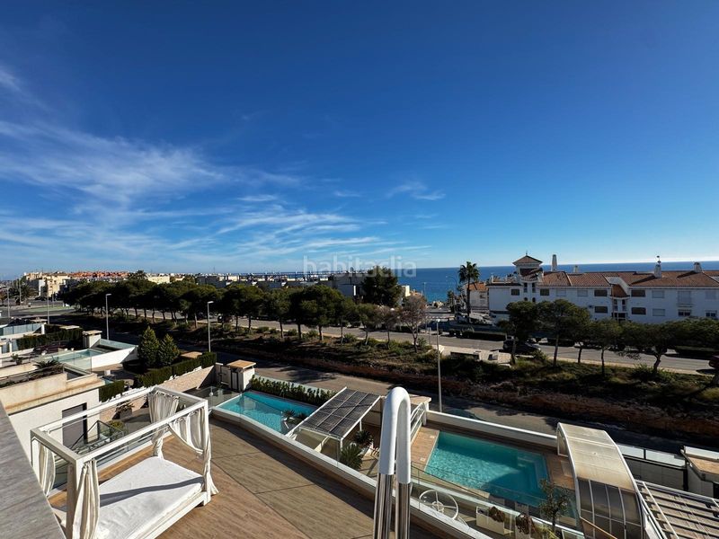 Foto 9499ebf2-1c40-452b-9bd9-61ce41563ecd. Casa amb aparcament a Playa Flamenca Orihuela