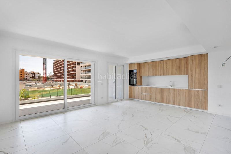 Foto 13ae7a6a-78a6-4ecd-a507-4bfadecfb7af. Apartament amb calefacció a Punta Prima Torrevieja