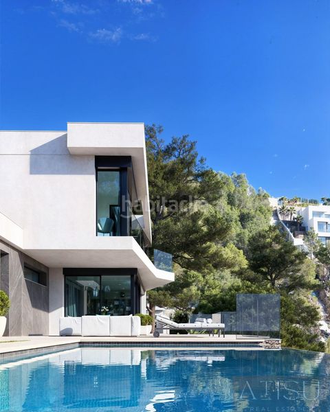 Foto bc70c6d3-26c0-4a9a-bd7c-e337e7bc299d. Chalet villa en La Fustera Benissa