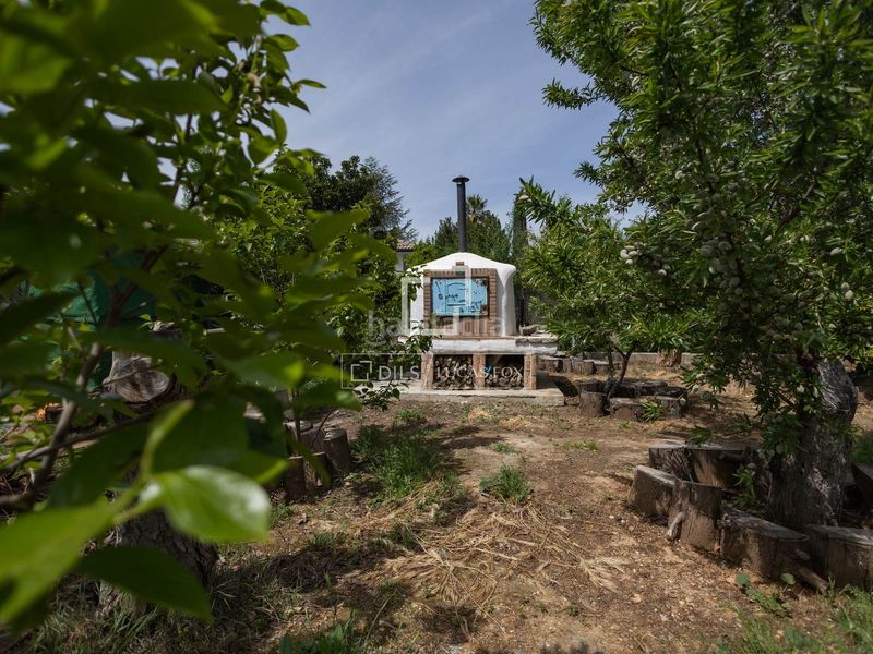 Foto 1f017caf-9efa-41a0-a008-72007fdf67bf. Chalet exclusiva villa de estilo andaluz con vistas panorámicas a la ciudad de granada y sierra nevada en venta en ogijares en Ogíjares