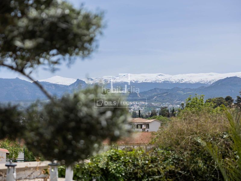 Foto a540d334-17bd-4374-ae8b-4bddc2dea050. Chalet exclusiva villa de estilo andaluz con vistas panorámicas a la ciudad de granada y sierra nevada en venta en ogijares en Ogíjares