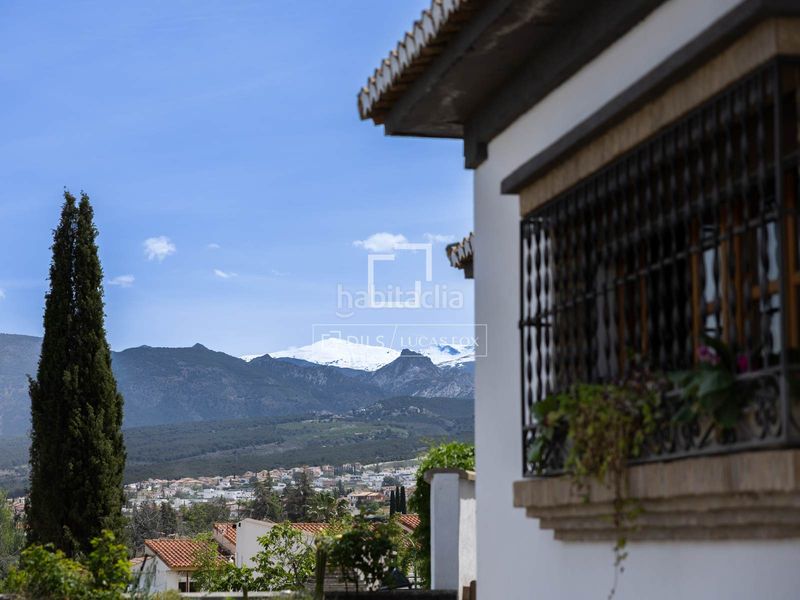 Foto e3db8f6f-92ea-415e-8fb1-351d7f3576c6. Chalet exclusiva villa de estilo andaluz con vistas panorámicas a la ciudad de granada y sierra nevada en venta en ogijares en Ogíjares