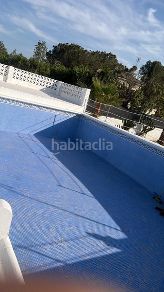 Foto e0e2b5b9-7aa1-46e3-baac-647159f42101. Casa amb aparcament piscina a Los Pinares-La Masia Bétera