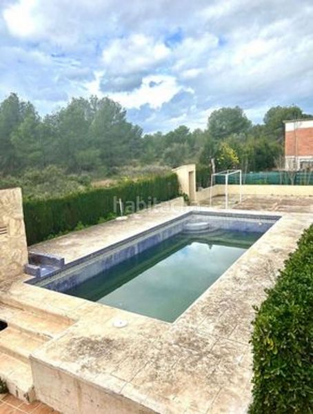 Foto c35f2d80-d24e-434f-96b5-49185103d6e0. Xalet amb piscina a Los Pinares-La Masia Bétera