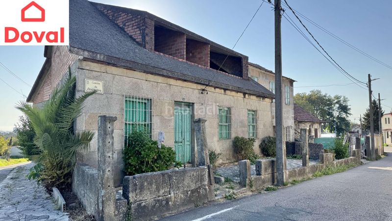Foto 6f6bdda4-3d04-43be-a763-332004a5c921. Casa amb aparcament a Alcabre Vigo