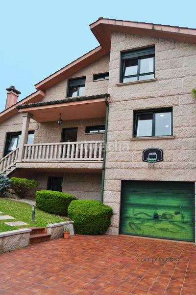Foto 9fecde3c-05ac-4775-8696-fee6efed9e74. Casa amb aparcament a Tui