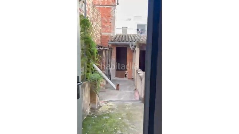Foto bf38c9d5-78ec-4b17-935e-372759e8fde1. Casa adossada a Algemesí