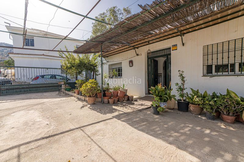 Foto cd77cacd-a4c6-4e13-8768-8f33ea3ecfe3. Masia amb aparcament a Residencial Jardín Botánico Málaga