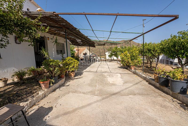 Foto fa5c4ed1-74ce-476f-a76d-2ab0fd004d96. Masia amb aparcament a Residencial Jardín Botánico Málaga