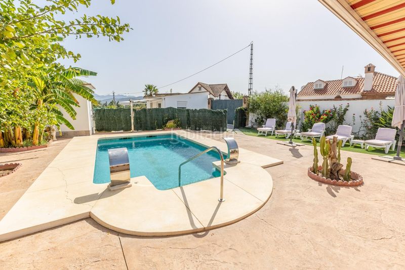 Foto dd15f2ad-16d8-4f82-b5bb-af8c7d5273ae. Casa amb piscina a Campanillas Málaga