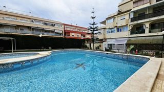 Àtic a Calle marcelina 46. Ático de 1 dormitorio con vistas al mar y piscina comunitaria