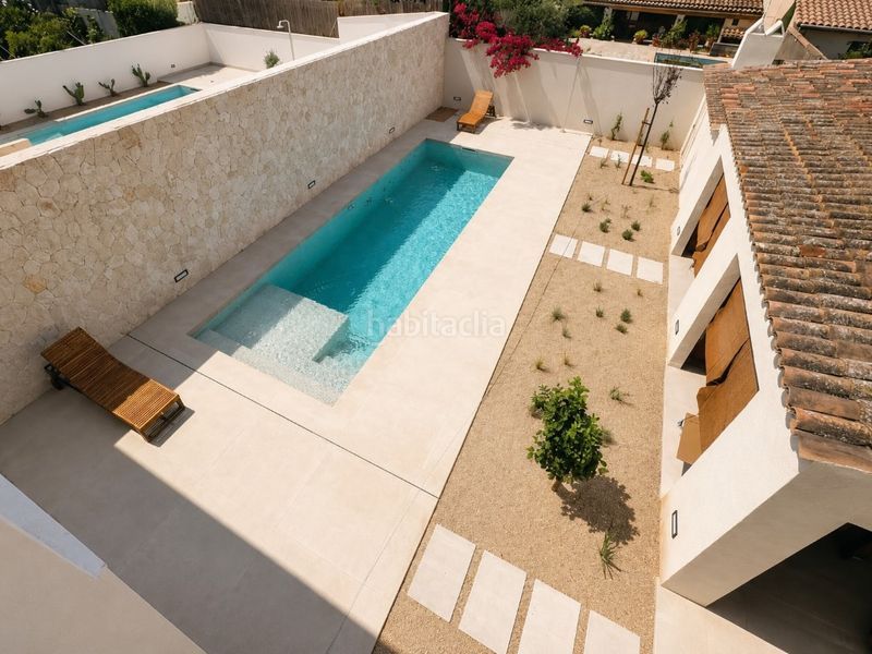 Foto 813af4d1-398e-42ac-9530-4fce34b54ee6. Casa aparellada amb aparcament piscina a Ses Salines poble Ses Salines