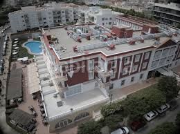 Foto 99061c51-50e7-4f61-acd2-dd212fe880ff. Edifici amb piscina a port d´Alcúdia-platja dálcúdia Alcúdia