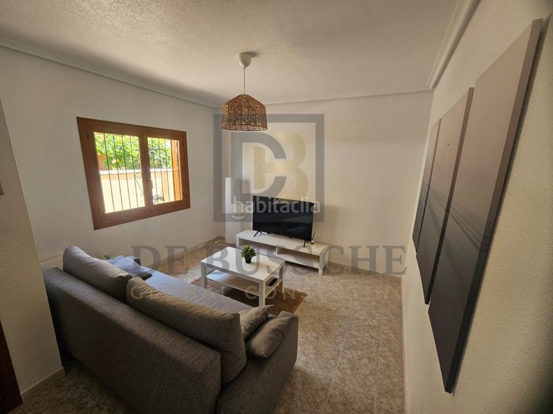 Foto 57130f1d-cdab-4701-99ee-8497945fc612. Casa amb piscina a Playa Flamenca Orihuela