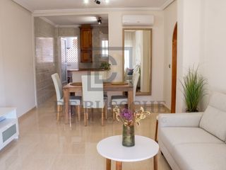 Appartement  Urbanizacion pau 25. Piso totalmente reformado a estrenar con terraza orientada al su