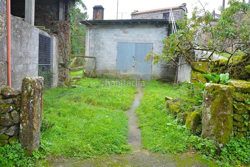 Foto 32d16783-02dc-4a48-a7e2-a4d68c6cb4ee. Casa amb aparcament a Vimianzo