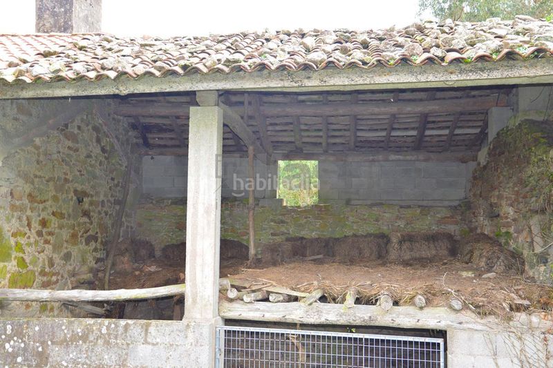 Foto ee5c5d66-0f47-4545-ba2d-8a385f95fab9. Casa amb aparcament a Vimianzo