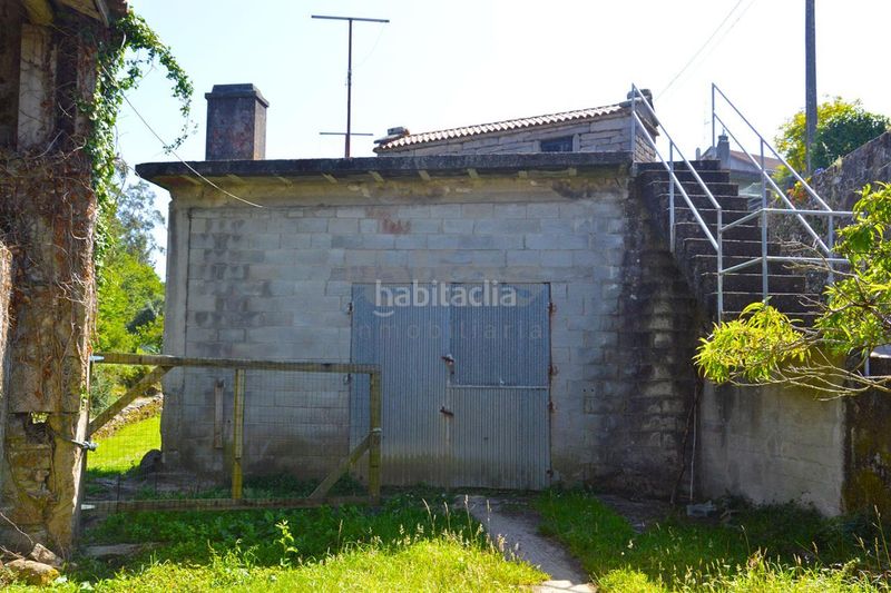 Foto f49238f0-3231-46d7-8fe3-49bc4e15d07b. Casa amb aparcament a Vimianzo