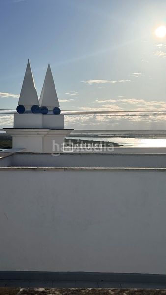 Foto 58674ebf-783c-4fc5-bd86-b2477d7cc561. Dúplex amb calefacció aparcament piscina a Isla Cristina