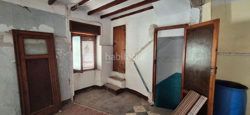 Foto 642f0c23-3529-41a8-9eca-d3e584fd8e9d. Casa amb xemeneia a Oliva pueblo Oliva