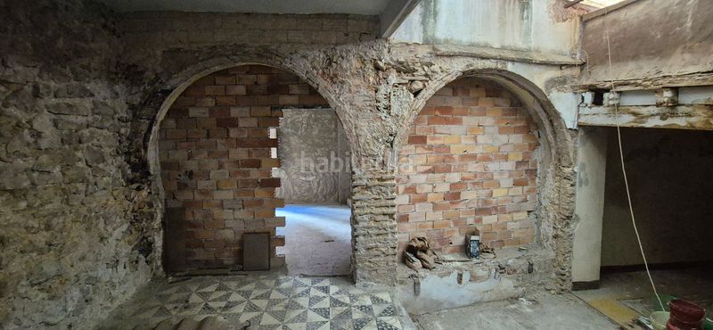 Foto a24268e3-9172-4b3c-97cb-07bf77a68fb8. Casa amb xemeneia a Oliva pueblo Oliva