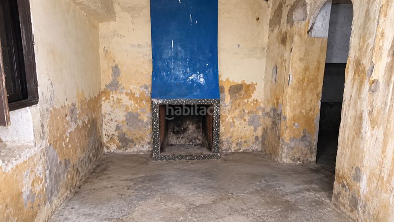 Foto ae342f14-ee78-4587-aa23-3c1ab4c5045c. Casa amb xemeneia a Oliva pueblo Oliva