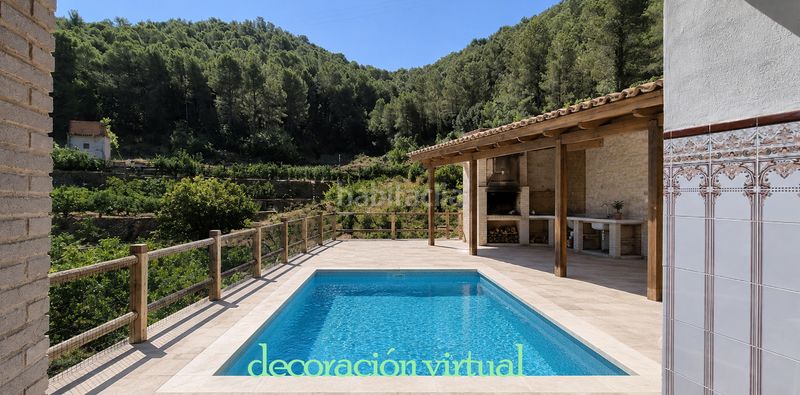 Foto 21f3de99-a0e3-436e-96dd-aa6b133b4453. Masia amb xemeneia calefacció aparcament piscina a Favara