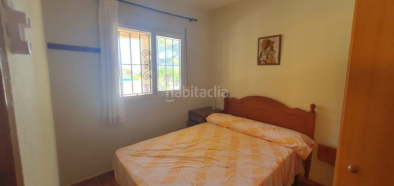 Foto b55a9003-118d-48d8-8559-58f8b00295ec. Masia amb xemeneia calefacció aparcament piscina a Llaurí
