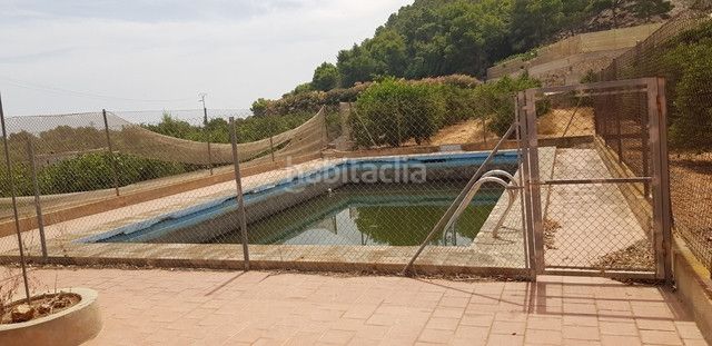 Foto 6a32216d-2174-4cee-969b-450d071b2a01. Masia amb xemeneia calefacció aparcament piscina a Tavernes de la Valldigna