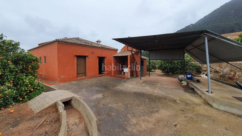 Foto 7cce4d57-09d6-40d0-b8d2-ac312dbedc01. Masia amb xemeneia calefacció aparcament piscina a Tavernes de la Valldigna
