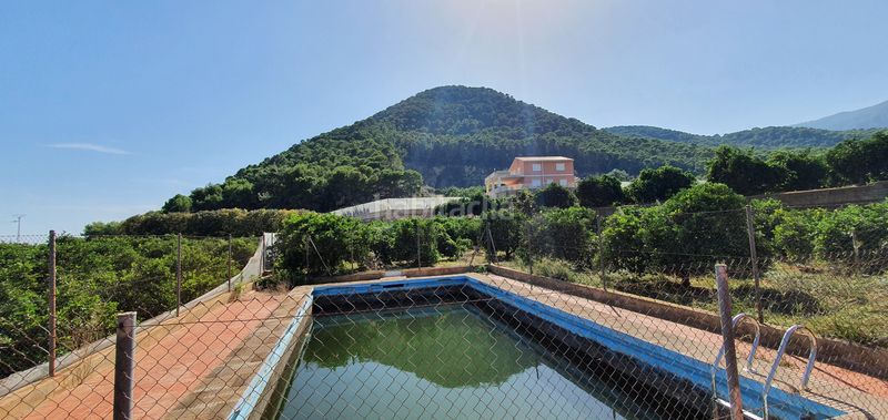 Foto 8676f654-f934-4f96-bf8b-1599f3b2573b. Masia amb xemeneia calefacció aparcament piscina a Tavernes de la Valldigna