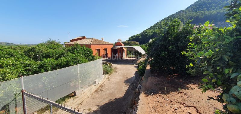 Foto a5ed0e27-a833-47d3-a493-6d9242738caf. Masia amb xemeneia calefacció aparcament piscina a Tavernes de la Valldigna