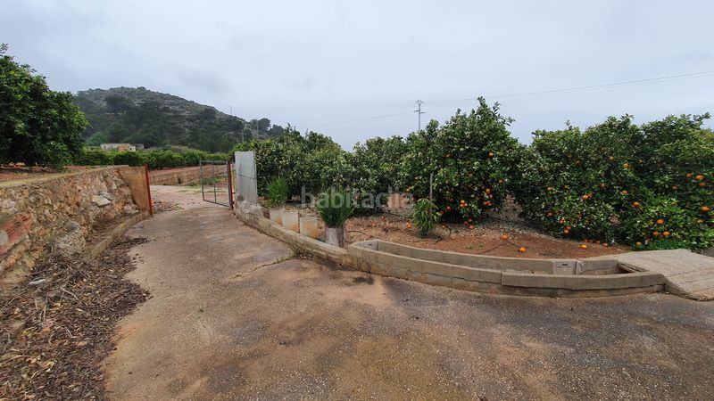 Foto b19affaf-f21f-429b-98ef-5d99c2a33575. Masia amb xemeneia calefacció aparcament piscina a Tavernes de la Valldigna