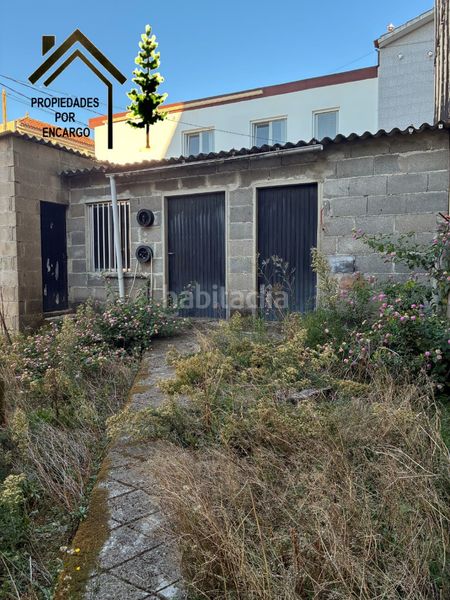 Foto 7dd58cea-a141-4fb9-978c-b12cd11158ff. Casa amb xemeneia aparcament a Moaña