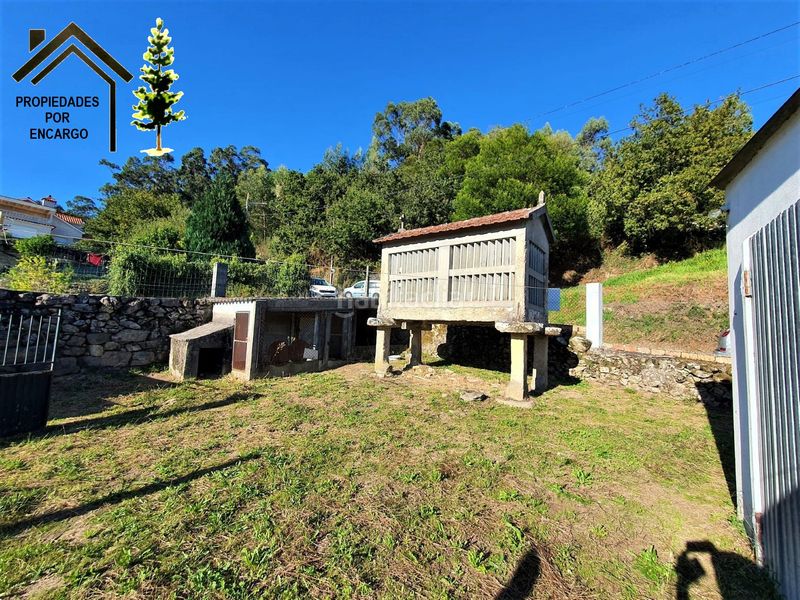 Foto 7065d341-7fdf-4845-a85b-100c15d24bc2. Casa amb aparcament a Coiro Cangas