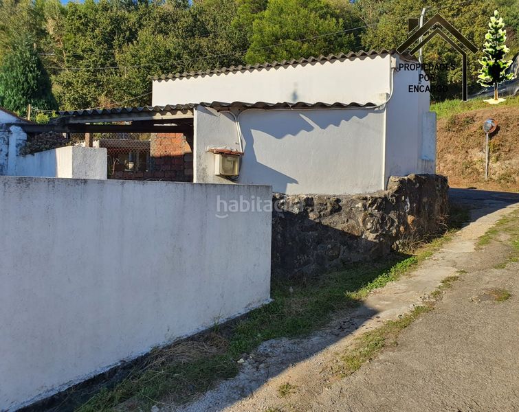 Foto 9291c12f-8972-42ec-816b-f7c9dc14e8bb. Casa amb aparcament a Coiro Cangas