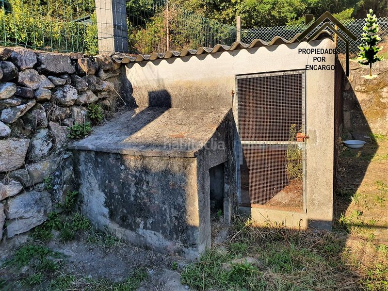 Foto 9f7ee1f9-b1a2-41a5-a3bf-6dba2b4a5edf. Casa amb aparcament a Coiro Cangas