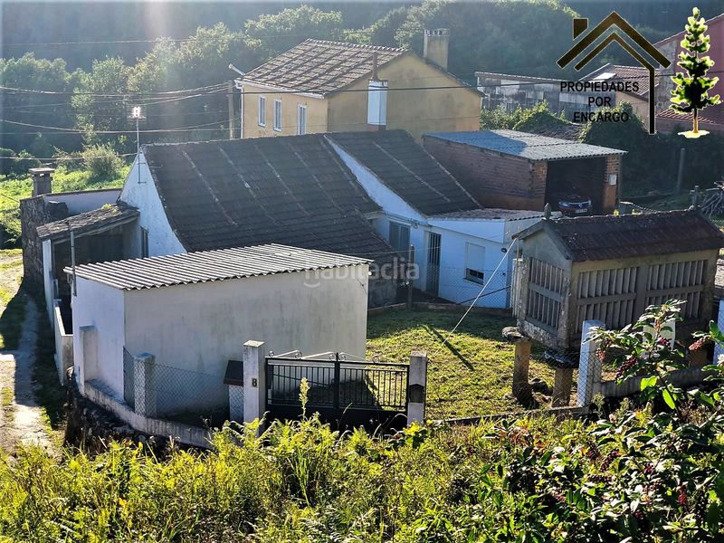 Foto a7c8e28f-ad94-4b4c-af28-040d370494d3. Casa amb aparcament a Coiro Cangas
