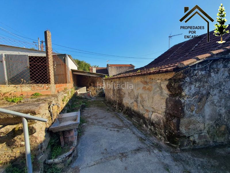 Foto f4a8bcde-51bc-4fc1-b0b4-631e597bbe11. Casa amb aparcament a Coiro Cangas