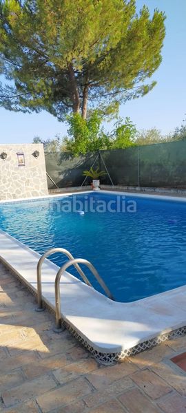 Foto a606bd52-c0b8-4ad2-81d6-d2c32ac1f5d6. Xalet amb aparcament piscina a Puente Genil