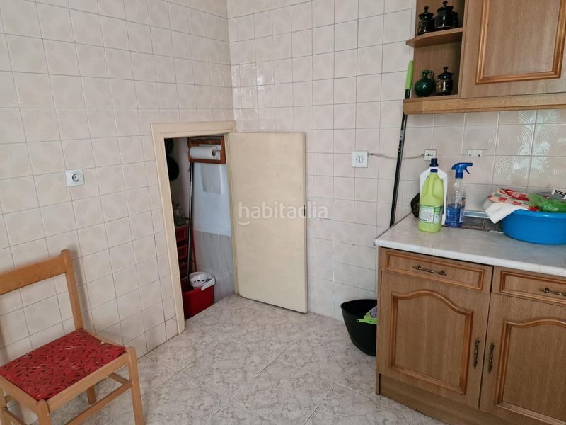 Foto cc27eabe-10e8-4346-93cd-790297b7a83d. Casa adossada a Baena