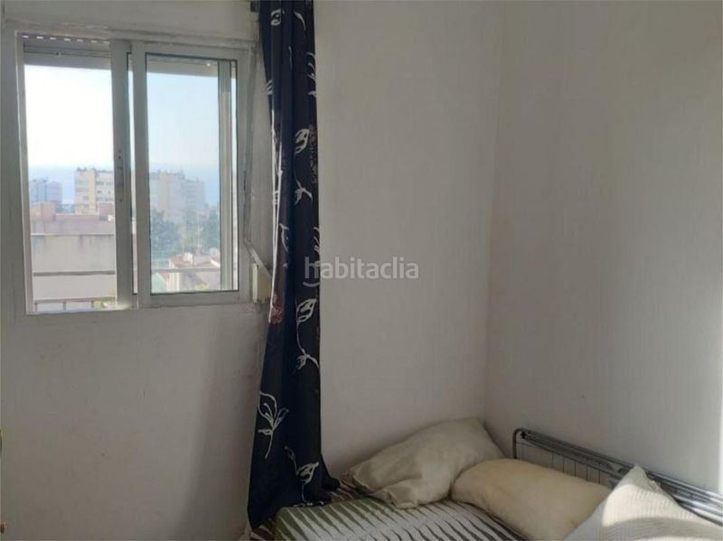 Foto ed57f7bb-8d96-43e3-ac24-ee1df9bc1584. Casa adossada amb aparcament piscina a Montemar Torremolinos