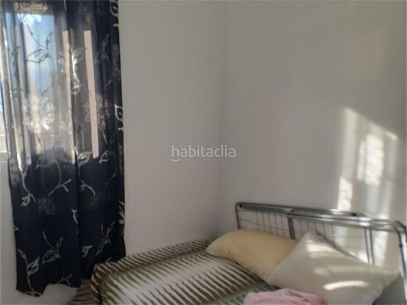 Foto fa6f5776-71af-4559-ab0b-42774e19f076. Casa adossada amb aparcament piscina a Montemar Torremolinos