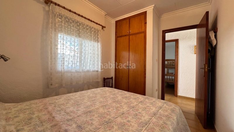 Foto 242f007d-1611-41b8-bed2-1597f541c089. Casa amb aparcament a Oliva nova Oliva