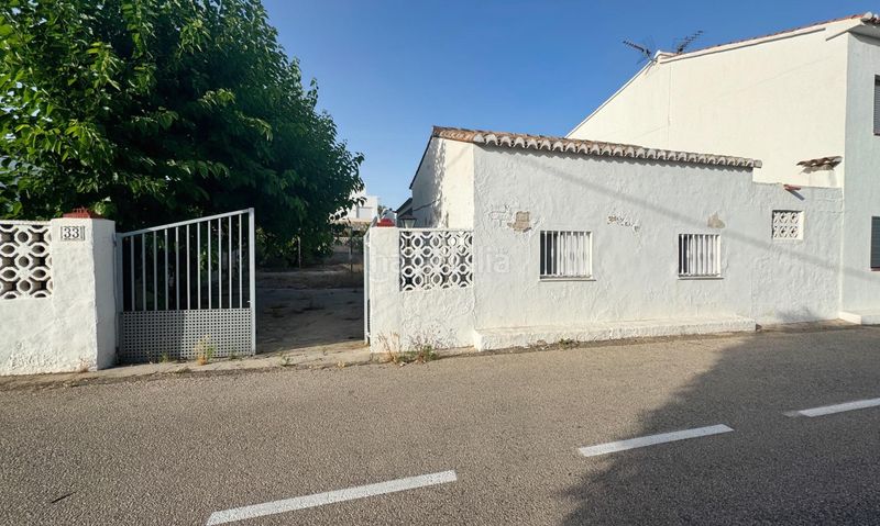 Foto 4d212820-0f59-4201-a742-f604d1004507. Casa aparellada amb aparcament a Oliva nova Oliva